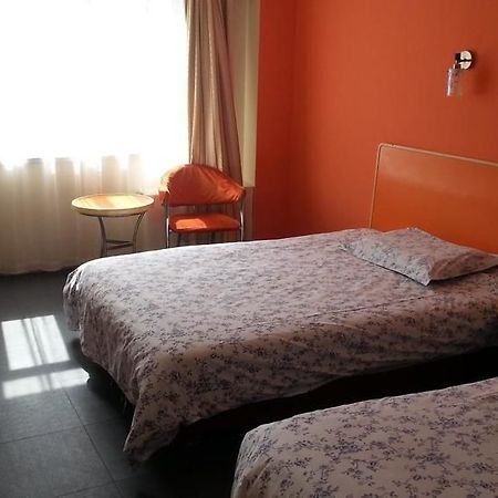 Motel 168 Hotel Урумчи Экстерьер фото